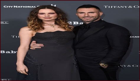 Behati Prinsloo Shares Rare Photo of Adam Levine With Newborn Baby